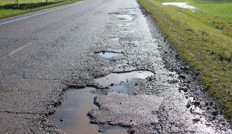 Strada asfalto buche